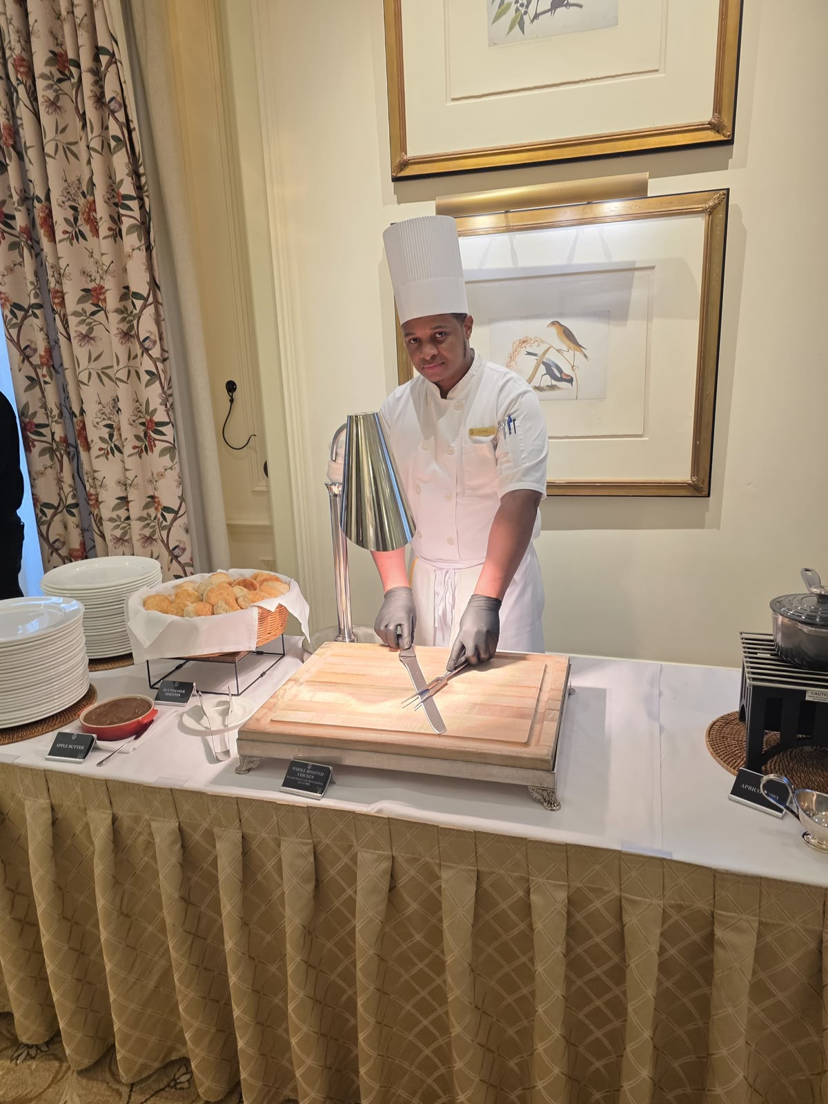 A Polaris participant working the carving station at a US banquet